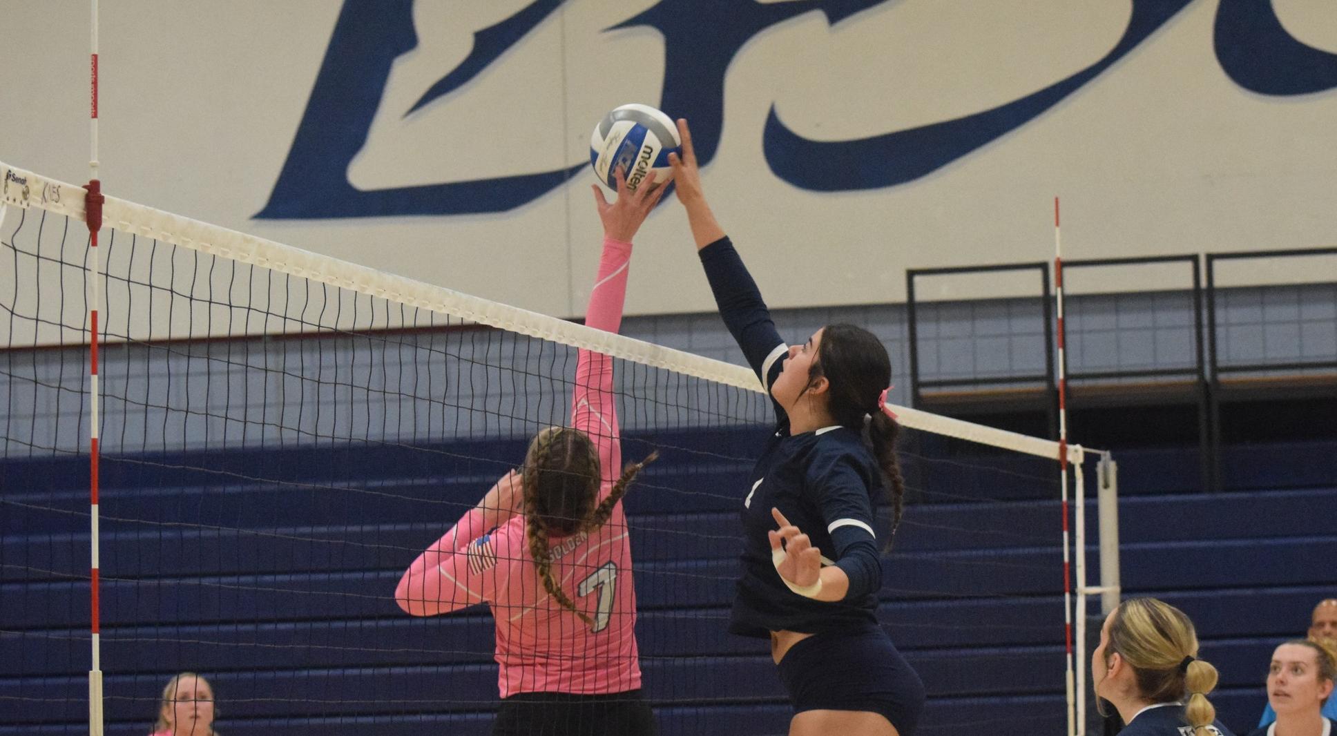 Women's volleyball team stays in first place with win over GWC