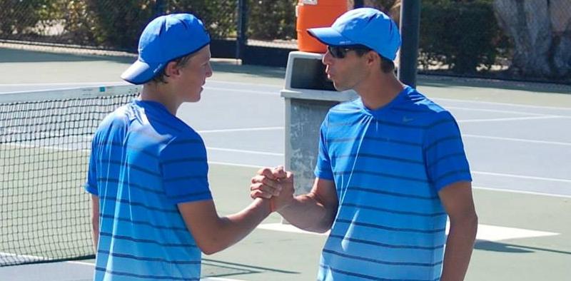 Men's tennis team one win away from perfect conference season