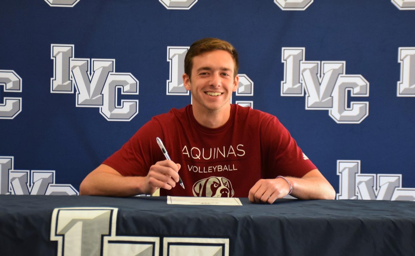 Men's volleyball player Ruben Lopez signs with Aquinas