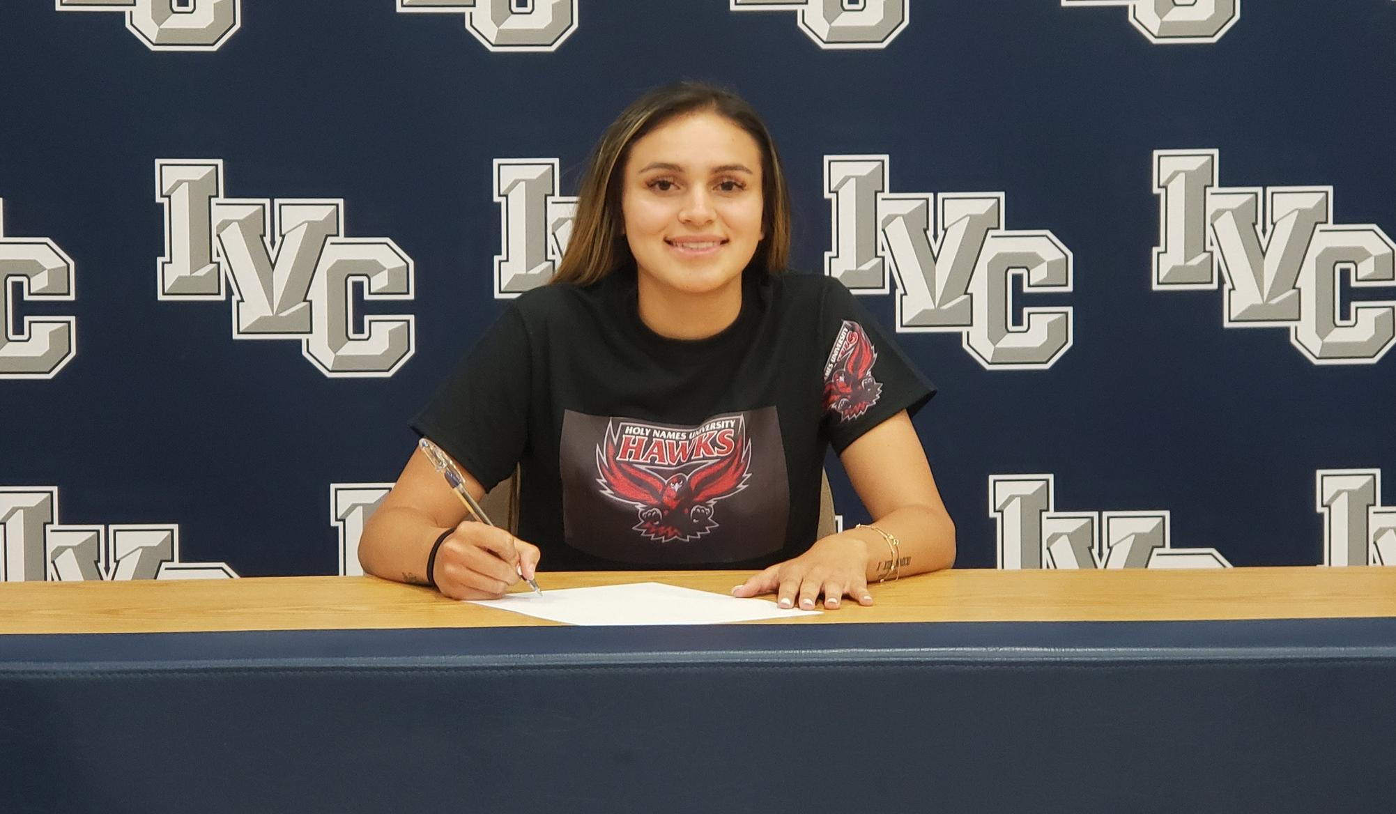 Women's basketball player Jessica Suruor signs with Holy Names