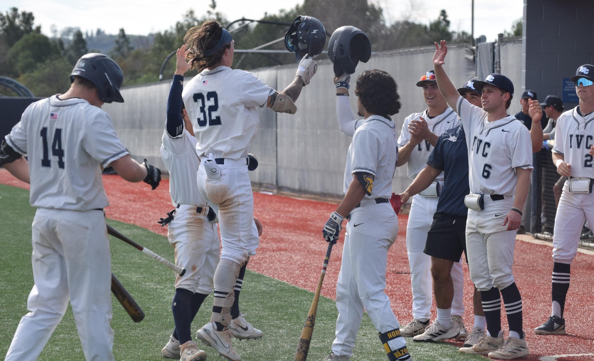 Baseball team scores early and often in 11-0 win over Vikings