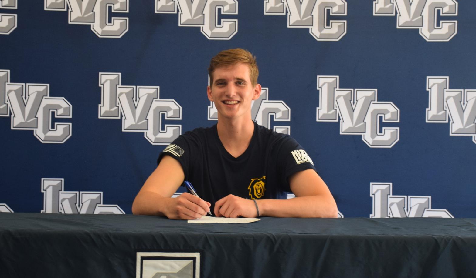 Men's volleyball player Declan Holder signs with Vanguard